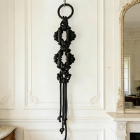 Décoration murale en corde noire à nœuds épais et pompons pour les marques de décoration intérieure et les détaillants transfrontaliers
