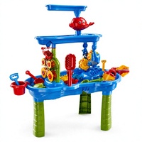 Table d'eau multi-niveaux en plastique bleu pour enfants, idéale pour les jeux de plage en extérieur avec sable et accessoires
