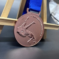 Medalla de diseño 3D de esmalte suave de forma redonda chapada en latón fundido a presión personalizada de fábrica, medalla de bronce deportiva de lucha de alta calidad