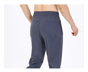 MOQ basso personalizzato <span class=keywords><strong>con</strong></span> <span class=keywords><strong>tasche</strong></span> <span class=keywords><strong>laterali</strong></span> <span class=keywords><strong>con</strong></span> Zip <span class=keywords><strong>pantaloni</strong></span> sportivi da jogging indossano <span class=keywords><strong>pantaloni</strong></span> da palestra <span class=keywords><strong>pantaloni</strong></span> sportivi da allenamento Fitness da uomo all'ingrosso - Product Image 4