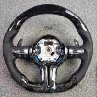 Volant en fibre de carbone série 1/3/5/6/7/8 utilisé pour BMW X1 X3 X5 X6 E30 E34 E36 E46 E81 E70 E82 E87 E90 E91 E92 E93 E60 E46
