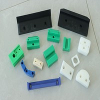 Composants de blocs coulissants et d'espacement pour un mouvement fluide dans les machines industrielles, blocs coulissants et pièces d'espacement en plastique