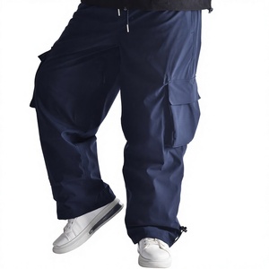 Pantalones de esquí impermeables de primera calidad para exteriores, azul marino estampado, con cintura elástica, estilo holgado, bolsillos cargo dobles y forro cálido. - Product Image 1