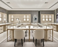 Ensemble de comptoirs de présentation de bijoux de luxe GZowin avec dimensions personnalisables, verre trempé, éclairage LED, finition dorée pour les magasins de détail
