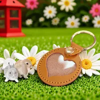 Cadeau pour les Amoureux des Animaux de Compagnie Porte-clés en Forme de Patte en PU Matériel Portable Porte-poils d'Animaux de Compagnie Souvenir d'Animaux de Compagnie Étui pour Amulettes de Cheveux Charmes de Sac