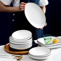 Ensemble de bols et d'assiettes en céramique et porcelaine, sans BPA, écologiques, résistants à la chaleur, durables, étanches, blancs avec bord noir, pour hôtel, restaurant, salle à manger