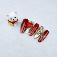 Uñas artificiales hechas a mano puras Forma de uña ovalada larga estilo festivo rojo Alta calidad y reutilizable