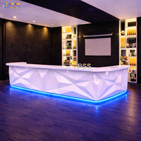 Comptoir de bar lumineux pour divertissement en pub, surface solide blanche, design futuriste, discothèque, musique live, salon, club, design d'intérieur