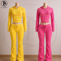 Ensemble de vêtements de Noël pour femmes en tricot gaufré avec logo personnalisé, veste à capuche à col en fourrure et pantalon évasé, ensemble de survêtement deux pièces