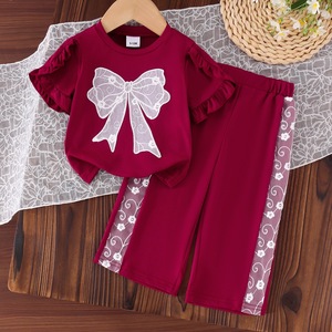 Completo Estivo per Ragazze: T-Shirt a Maniche Corte con Fiocco Rosso e Pantaloni in Cotone Stampato - Product Image 1