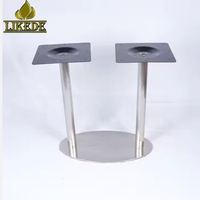 Base de table de bistrot moderne à double colonne en acier inoxydable poli, ovale, avec plateau supérieur noir