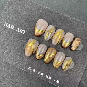 <span class=keywords><strong>Uñas</strong></span> Postizas Hechas a Mano de Alta Calidad al por Mayor, Reutilizables, Forma de Almendra, <span class=keywords><strong>Cortas</strong></span>, Estilo Francés, <span class=keywords><strong>Color</strong></span> Café - Product Image 4
