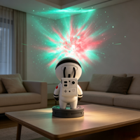 Lampe de bureau décorative à projection d'étoiles romantique astronaute - Étoiles colorées sur l'atmosphère du ciel - Lumière de nuit USB pour chambre à coucher