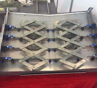 Couvercle de soufflet en acier à ressort télescopique conique en acier inoxydable de conception personnalisée pour la protection de vis à billes de tour de machine CNC