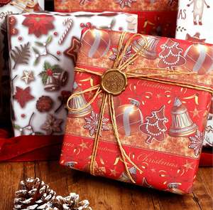 Rollo de papel de regalo Kraft de Navidad desechable al por mayor 80gsm tejido 43*300cm embalaje de regalo de lujo personalizado recubierto de silicona - Product Image 4