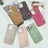 Étui de téléphone portable antichoc en PU motif crocodile avec bracelet métallique et bordure dorée pour iPhone 14, 14 Pro, 14 Pro Max, 15, 17