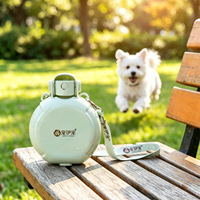 Nouveaux accessoires pour animaux de compagnie 2026 : Bouteille d'eau portable 2-en-1 de 500 ml pour chien avec gamelles et distributeurs de nourriture, idéale pour les voyages en extérieur et les promenades