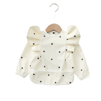 Tabliers pour enfants personnalisés en polyester 100% PU imperméables smockés à manches longues produits pour bébés tablier à bavette d'entraînement