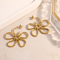 Boucles d'oreilles pendantes en forme de fleur en fil ouvert en acier inoxydable plaqué or 18 carats, boucles d'oreilles minimalistes à motif floral creux pour femmes