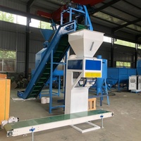 Machine d'emballage de granulés de biomasse boisée, machine de remplissage et de scellage de sacs de granulés d'aliments pour animaux