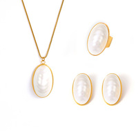 Ensemble de bijoux en acier au titane plaqué or 18 carats étanche pendentif collier boucle d'oreille sans ternissement taille 7 bague femmes