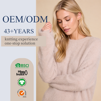 Pull-over doux et ample en mélange alpaga-mérinos pour femme, col rond, idéal pour toutes les saisons et les superpositions.