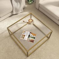 La table basse en verre moderne la plus vendue en 2025 C'est une table centrale carrée et simple pour les salons et les bureaux à domicile
