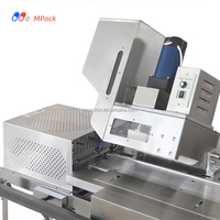 Machine d'emballage sous blister avec positionnement par curseur pour aliments, bonbons, blocs de thé, cubes de sucre et comprimés effervescents