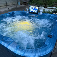 Spa extérieur moderne haut de gamme bleu avec intensité de massage réglable par air et eau, et éclairage LED