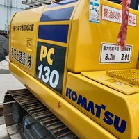 Excavatrice d'occasion Komatsu PC130 entièrement inspectée, poids en ordre de marche de 13 tonnes, capacité de la benne de 0,53 m³, plusieurs accessoires