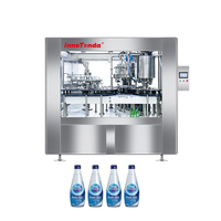 Machine de remplissage entièrement automatique pour bouteilles de verre, de canettes et de bouteilles PET, pour eau pure, eau plate et boissons gazeuses