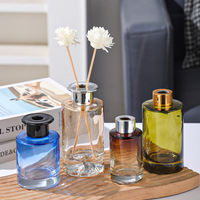 Bouteille diffuseur en verre cylindrique en gros, vase en verre vide électroplaqué pour parfum d'ambiance domestique