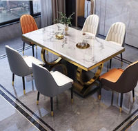 Vente directe d'usine Meubles de salle à manger de luxe modernes et légers Configuration de table à manger rectangulaire en marbre 4-8 sièges