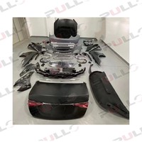 Pour Benz W221 06-13 à W223 Maybach kit carrosserie comprend des ailes de capot de calandre de pare-chocs avant et arrière feux automatiques de porte arrière