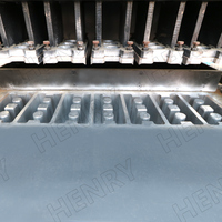 Machine de fabrication de briques à emboîtement dans le sol Hr7-10 La plus récente machine de fabrication de briques en argile et ciment