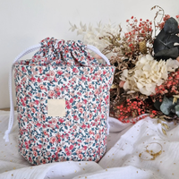 Sac de rangement pour jouets en coton matelassé personnalisé au design floral Sac de maquillage Panier de nettoyage de bureau pour couches Organisateur rond Seau de rangement Bakset