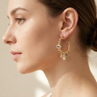 Nouvel ensemble de boucles d'oreilles créoles tendance Nazar avec breloque Hamsa dorée et pavé de pierres, pour femme, porte-bonheur, cadeau idéal pour soirée