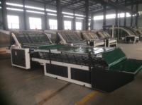 Machine à laminer semi-automatique pour carton ondulé, pour la lamination des boîtes en carton