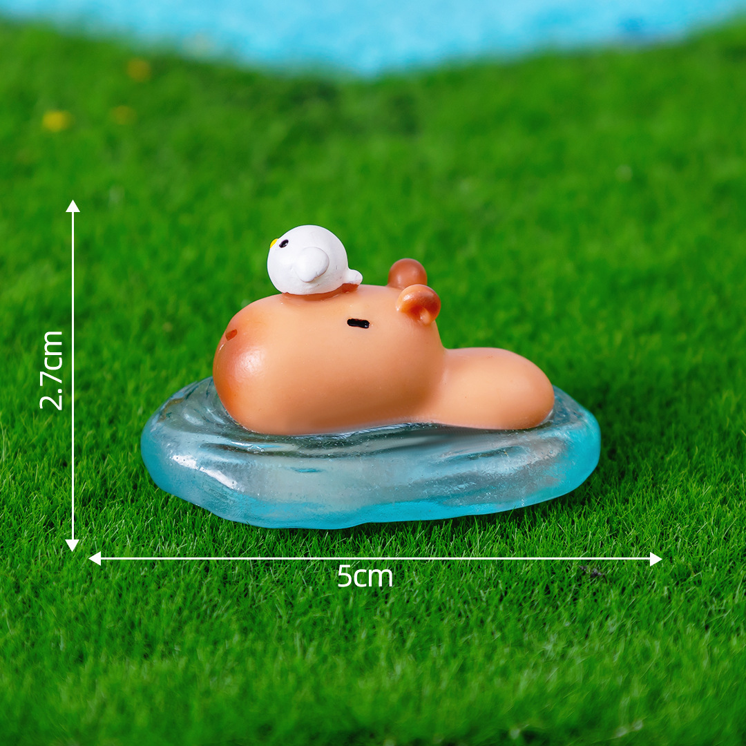 10 # Capybara de natation rose