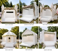 Château gonflable blanc pur avec toboggan pour enfants, idéal pour les fêtes de mariage en extérieur
