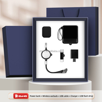 Venta caliente Premium Personalizable Corporate Gift Set Auriculares Cable Power Bank Cargador rápido USB Ideal para promociones de negocios