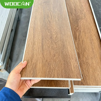 Revêtement de sol en vinyle SPC moderne à motif marbre uni, imperméable, dalles de sol en PVC à emboîtement pour bureaux, centres commerciaux, appartements, intérieur
