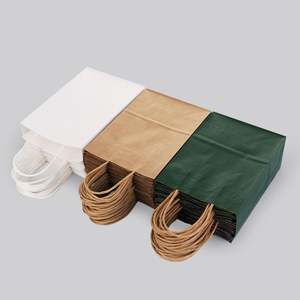 Sacs en papier kraft blanc et brun, offrant des services personnalisés, adaptés aux cafés, aux restaurants et aux magasins de vêtements. - Product Image 6