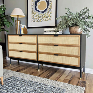 Meuble Isabella en bois de teck massif avec portes en rotin naturel et pieds en métal alliant élégance et charme organique - Product Image 1