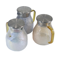Carafe à thé en verre borosilicate alvéolé en gros, pichet à eau en verre avec couvercle-filtre intégré pour le stockage de boissons froides domestiques