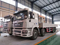 Grue à flèche droite montée sur camion de 16 tonnes à haute capacité avec stabilisateurs pour le chargement de machines lourdes et la logistique de grands projets