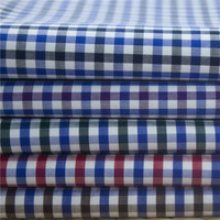 Tissu de chemise à carreaux respirant en coton longues fibres 100% 70S teint en fil, finition à l'ammoniaque liquide, toucher doux, vente en gros