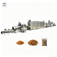 Ligne de production d'aliments secs pour animaux de compagnie, équipement d'extrusion à double vis pour croquettes pour chiens, chats et poissons, capacité personnalisée de 30 à 4000 kg/h