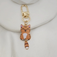 Porte-clés en alliage métallique en gros, en forme de cœur ou rond, pour femmes et filles, avec motif de chat de dessin animé mignon, idéal comme cadeau promotionnel