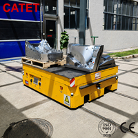 Atelier de manutention lourde Alimenté par batterie au lithium 30 tonnes Voiture plate à voie électrique avec 4 roues en acier allié